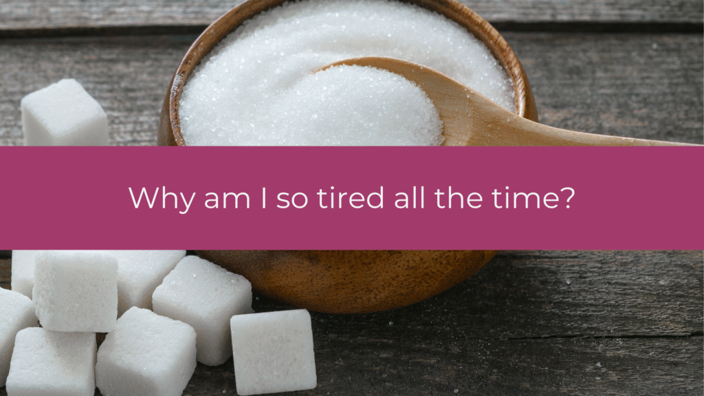 Woman experiencing exhaustion, illustrating why am I so tired all the time, with bloating and fatigue symptoms