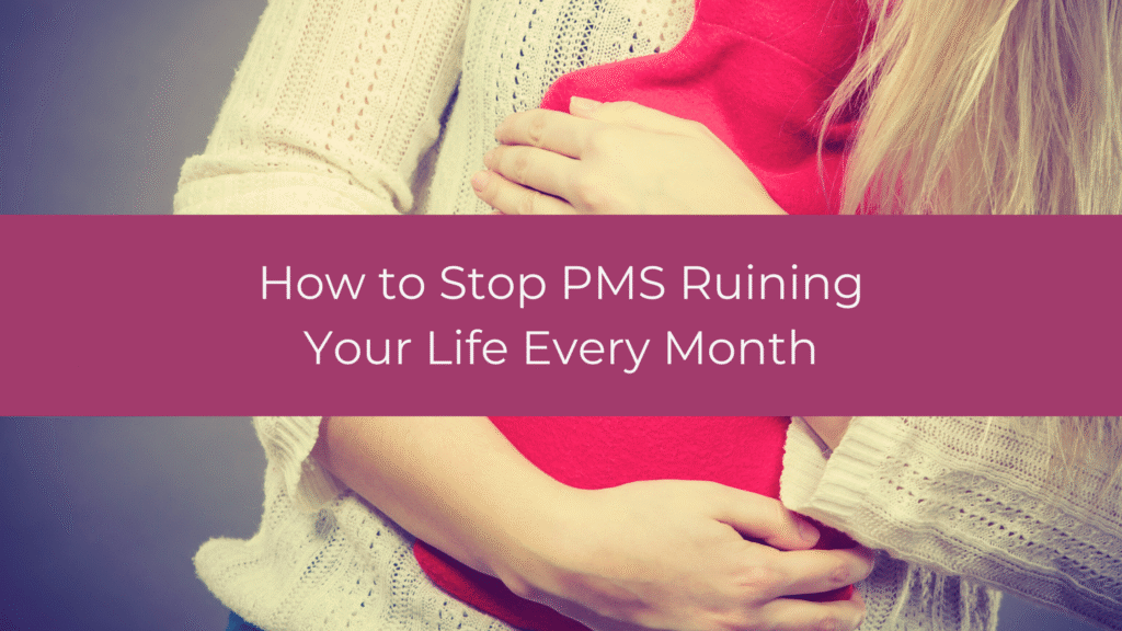 Woman experiencing PMS symptoms holding her abdomen, illustrating how to manage PMS naturally